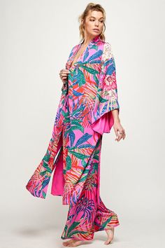 Tropical Vibe Kimono FABRIC & FIT: Model is wearing size Small.