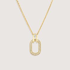 A gold chain and pendant, inspired by the interlinking of cufflinks, brings this necklace to life. As part of our Tailored Collection we studied all elements of suiting, and were fascinated by how a cufflink weaves itself through a button hole and connects to offer a practical yet beautiful finish. The oval pendant with diamond tracing hangs onto the chain with a hook that has a diamond at its center. The frame of the pendant measures 17mm and has 25 diamonds set within. If ordered in rose gold, the chain will be our Rollo chain. All features can be customized! Please contact us if you wish to make changes, we love making custom designs. All of our jewelry is carefully handmade in our atelier. *HC diamond are all conflict-free diamonds To order by phone 972-72-2991000 Gold Chain And Pendant, Chain And Pendant, Gold Chain With Pendant, Button Hole, Oval Pendant, Creative Arts, White Diamonds, Conflict Free Diamonds, Side View