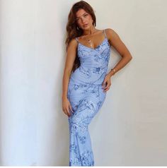 Step into Summer with style in the Inessa Floral Maxi Dress! This French-inspired dress features a figure-hugging bodycon fit, romantic floral print, and lace detailing that'll have everyone doing a double take! With an attractive blue color and a V-neckline, you'll look ravishing in this Good Girl Things - Summer's in Bloom Collection piece. Who says elegance can't be fun?! Inessa Floral Maxi Dress in Blue Romantic Elegant French Style Figure Hughing Bodycon Fit Attractive Colors V-Neck Lace De Elegant Blue Bodycon Dress With Sweetheart Neckline, Blue Fitted Bodycon Dress For Prom, Fitted Blue Bodycon Dress For Prom, Blue Floral Print Dress For Prom Season, Blue Floral Print Prom Season Dress, Light Blue Floral Print Maxi Dress For Party, Blue Floral Print Prom Dress, Blue Floral Print Dress With Sweetheart Neckline, Elegant Floral Print Bodycon Maxi Dress