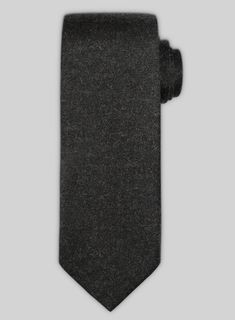 This pure wool Tweed Tie has been hand crafted with premium finish. 
 
 This tie would compliment your suits or blazers and will stand out with it's solid finish. 
 
 A must have for your neckwear collection that you won't find anywhere else. 
 
 Width at widest : 2.75 inches.