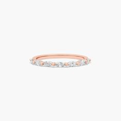 a rose gold and white diamond ring