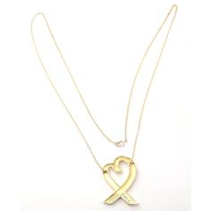 Tiffany & Co Picasso 18k Yellow Gold Large Heart Pendant Necklace       Metal: 18k Yellow Gold  Measurements:  Length: 25"  Width: 2mm  Weight: 9.9 grams  Pendant: 1.5" X 1"  Hallmarks: Tiffany & Co Paloma Picasso 750  Please reference the dimensions in the description for the best approximate dimensions. Paloma Picasso, Metal Necklaces, Heart Pendant Necklace, Tiffany & Co., Heart Pendant, Yellow Gold, Yellow, Pendant Necklace, Pendant