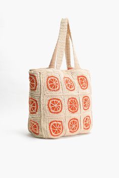 Multi-purpose crochet tote Comfortable double shoulder straps Metallic button closure Made in a durable fabric Fully lined interiors with zip pocket inside Size: 18" x 15" x 5" Embrace sunny days and seaside vibes with our Orange Crochet Beach Tote, the perfect companion for your next beach adventure or casual outing. Crafted with versatility in mind, this multi-purpose tote is as stylish as it is practical.Featuring comfortable double shoulder straps, this tote is designed for easy carrying, wh Orange Square Bag For Vacation, Square Orange Bag For Vacation, Orange Square Vacation Bag, Orange Summer Crochet Bag For Beach, Orange Crochet Travel Bag For Summer, Orange Crochet Summer Beach Bag, Orange Summer Crochet Beach Bag, Casual Orange Crochet Bag For Vacation, Orange Woven Crochet Bag For Vacation