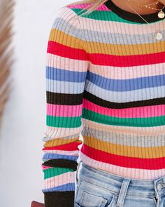 Fitted 55% Acrylic and 45% Cotton Hand Wash Cold. Dry Flat Crew Neckline Long Sleeves Knit Fabrication No closures Not Lined Our Free To Love Striped Sweater takes us back to a simpler time with these retro stripes! We love the fitted silhouette and ribbed fabrication on this sweater that is striped in hues of bright pink. dark olive. blue. blush. green. light blue. red. mustard. heather grey. and nude. This piece would pair fab with high rise denim! Styled with the El Dorado Hat. Perfect Hoop E Off Shoulder Evening Gown, Simple Bangle, Mini Necklace, Skater Style, Mini Skater Dress, Pink Dark, Retro Stripes, High Rise Denim, Striped Sweater