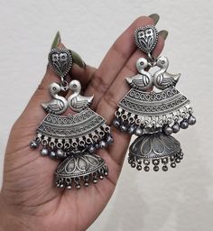 Around 2 inches Silver alike brass made Silver Temple Jewelry Chandelier Earrings With Latkans, Silver Metal Jhumkas With Latkans, Silver Earrings With Bells For Festivals, Silver Bell Earrings For Festivals, Traditional Silver Earrings With Bells, Traditional Silver Bell Earrings, Silver Metal Jhumkas For Festive Occasion, Silver Temple Jewelry Jhumkas, Silver Temple Jewelry Style Jhumkas