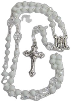 Silver Beaded Rosary For First Communion, White Spiritual Crucifix Jewelry, Spiritual White Crucifix Jewelry, White Cross Jewelry With Miraculous Medal, Silver Faceted Beads Rosary Cross, White Crucifix Rosary With Miraculous Medal, White Spiritual Rosary With Miraculous Medal, Spiritual White Rosary With Miraculous Medal, White Beaded Cross Rosary