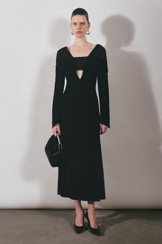 Crafted from elegant satin crepe, this midi dress exudes sophistication and grace. Its long sleeves and sheath silhouette add a touch of elegance, making it the perfect addition to your wardrobe for any special occasion. Bodycon Midi Length Long Sleeve Evening Dress, Evening Bodycon Long Sleeve Midi Dress, Bodycon Long Sleeve Midi Dress For Evening, Elegant Bodycon Long Sleeve Evening Dress, Elegant Bodycon Long Sleeve Dress For Date Night, Bodycon Midi Dress For Fall Evening, Elegant Bodycon Midi Length Dress, Elegant Evening Midi Dress For Fall, Sleek Long Sleeve Midi Dress For Dinner