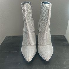 Andiamo Heeled Boots With All Over Silver, Sparkle Bling Rhinestone Design. Side Zipper Closure. Brand New Without Box. Gorgeous Boots If You Want To Be A Little Extra!!! Size: 7 M Heel: 4 1/2” Shaft: 7 1/2” Gorgeous Boots, Silver Sparkle, Rhinestone Designs, Side Zipper, Heeled Boots, Bootie Boots, Ankle Boots, Sparkle, Size 7