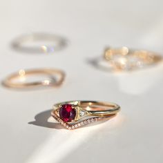 A romantic ruby, set between Jennie Kwon�s signature milgrain-edged triangles. Classic, with modern touches: a 21st century ring. See "Details" for item specifics (carat weight, metal, etc) Luxury Ruby Marquise Cut Rings, Elegant Marquise Cut Ruby Ring, Timeless Ruby Rings For Wedding, Elegant Ruby Stackable Rings For Formal Events, Elegant Ruby Stackable Rings For Formal Occasions, Fine Jewelry Red Wedding Ring With Rose Cut Diamonds, Elegant Ruby Stackable Rings With Round Band, Formal Ruby Stackable Rings Fine Jewelry, Timeless Red Diamond Rings