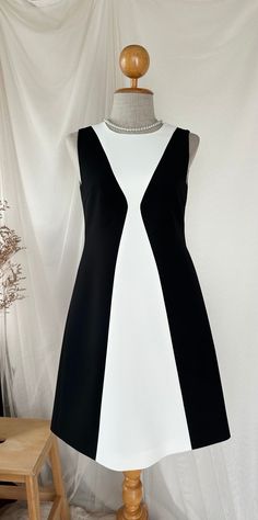 *DHL shipping upgrade is available at check out process. Shipping part by DHL will take 3-6 days only. Production time may take around 2-3 weeks. If this is in rush you can convo us to make it sooner.:) 🖤Queen Chess🖤 a dress from an inspiration. The combination of white and black is cool. The dress is simply elegant that you should include her to your closet. Will make you look stylish and chic in all occasions. Pear her nice with all style of your shoes and accessories to be very special day to night look good for all dress up and down. 💕  Also custom length for this dress is available please convo. DESIGN✄: -A line -Sleeveless  -Back zipper -Fully Lining -Longer length (requestable) please convo MATERIAL✄: *Amena fabric  (Polyester, bright color, not shining content, flattering one.) White A-line Mod Dress, Black A-line Dress For Summer, White A-line Mini Dress In Mod Style, White Mod Mini Length Dress, Black A-line Summer Dress, Black Mod Fit Dresses, Black Fitted Mod Dress, Retro Black A-line Mini Dress, Black And White A-line Summer Dress