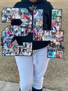 a young child holding up the letter e made out of photo collages and photos