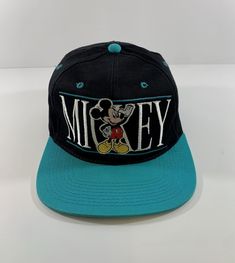 Vintage Mickey Mouse The Disney Store Spellout Logo Snapback Hat. Disney Adjustable Baseball Cap, Adjustable Disney Baseball Cap, Mickey Mouse Baseball Cap, One Size Fits Most, Vintage Snapback Hat For Fan Merchandise, Adjustable Mickey Mouse Cap, Disney Adjustable Cap, Adjustable Disney Cap, Vintage Mickey Mouse, Vintage Mickey