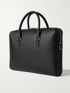 SAINT LAURENT's briefcase is a refined classic that's been perfected over the decades. Crafted from black full-grain leather, it has a structured silhouette that's smart and sleek. Use it to elevate your workwear repertoire. Elegant Saffiano Leather Briefcase For Formal Use, Elegant Formal Briefcase In Saffiano Leather, Elegant Formal Saffiano Leather Briefcase, Classic Saffiano Leather Briefcase, Formal Textured Leather Rectangular Briefcase, Designer Textured Leather Briefcase For Business, Sleek Leather Briefcase For Formal Occasions, Luxury Textured Leather Briefcase For Formal Use, Timeless Textured Leather Briefcase For Business