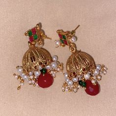 Imported From India, Ethnic Style Desi Bell Earrings In Bold Red And Emerald ***Check Out My Additional Desi/Pakistani/Gujarati Jewelry And Clothing In My Closet*** Nwot Never Used Elegant Red Jhumkas For Festive Occasions, Red Jewelry For Eid Celebration, Red Danglers For Diwali, Red Drop Jhumkas For Party, Red Dangling Jhumkas For Party, Red Dangle Jhumkas For Party, Navratri Festive Bohemian Earrings, Bohemian Earrings For Navratri Festival, Red Bollywood Danglers