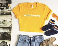 Wild Honey Shirt, hipster tshirt, womens, retro, boho tshirt, camping, 70s clothing, good vibes, honey tee, trendy fashion, yellow, tumblr Female Shirt Designs, Boho Tshirt, Honey Shirt, 70s Summer, Cute White Tops, Women Fall Tops, 70s Clothing, Fashion 70s, Wild Honey