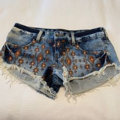 Billabong Denim Shorts With Machine Stitched Design On The Front. Zip Front With Front And Back Pockets. Pre Owned But Never Worn In Very Nice "Distressed" Denim Condition. Casual Festival Jeans, Bohemian Denim Shorts, Casual Orange Summer Jeans, Billabong Shorts, Stitch Design, Green Orange, Billabong, Green And Orange, Distressed Denim