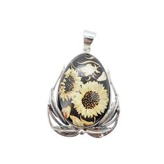 Baltic Amber Sunflower Intaglio Pendant Elevate your style with our exquisite Sunflower Baltic Amber Intaglio Pendant. This handcrafted masterpiece combines the warmth of Baltic Amber with the timeless beauty of an intricately carved sunflower intaglio. Each piece is a unique work of art, showcasing the rich hues of amber in a mesmerizing dance of golden tones polished to a lustrous shine! 56X37mm, Made in Poland. You will receive one Pendant. Arrives to your home with the "All About Amber" Broc Baltic Amber, Timeless Beauty, Cognac, Poland, Sunflower, Amber, Pendant, Beauty, Art