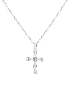 Add a sweet sparkle to any look with this matching cross pendant and stud earrings set featuring sparkling cubic zirconias. 18 1/2" length with 3" extension necklace, 0.5", 0.4" 0.3" diameter earrings
 Silvertone plate/cubic zirconia Imported Cross Pendant Necklace, Stud Earrings Set, Necklace Earring Set, Necklace Earrings, Earrings Set, Cross Pendant, Earring Set, Nordstrom Rack, Cubic Zirconia