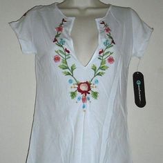 Beautifully Designed Coolwear Cute White Embroidered Flowers Fun Summer Comfy Top Sz M. It Will Be Great For The Summer And Beyond. It Is A Must Have. Chest: 34" Sleeves: 4" Length: 25" Thank You For Looking, Have A Great Day. White Short Sleeve Embroidered Spring Top, White Short Sleeve Embroidered Top For Spring, White Embroidered Short Sleeve Top For Spring, White Embroidered Top With Short Sleeves For Spring, White Casual Embroidered Top With Floral Print, White Tops With Floral Applique, Casual White Embroidered Top With Floral Print, Spring White Blouse With Floral Applique, White Floral Applique Blouse For Spring