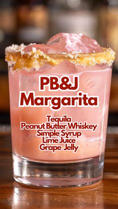 a close up of a drink on a table with text over it that reads p & j margarita tequila peanut butter whiskey simple syrup lime juice grape jelly