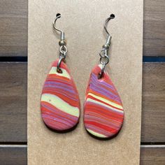 100% clay, all original, and one of a kind! I have been exploring clay and am starting to love it. This blend is inspired by Iowa State. Go Cyclones! Get both pairs for you and another. Such beauty! *earrings sold separately Multicolor Clay Jewelry With Matching Earrings, Artsy Clay Earrings For Gift, Multicolor Clay Dangle Jewelry, Handmade Multicolor Clay Earrings, Hand Painted Clay Earrings For Everyday Wear, Handmade Artsy Clay Earrings, Hand Painted Artsy Earrings For Everyday, Artsy Hand Painted Earrings For Everyday, Everyday Hand Painted Artsy Earrings