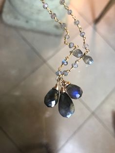 "Gorgeous! Blue Flash Labradorite Necklace 3 Labradorite Drops 15mm, 12mm, 11mm Rondelle beads 3 to 3.5mm Pear beads in chain 6mm 28\" Long 22k GP over Sterling Silver Lobster clasp ✤ Items usually ship in one business day, excluding weekends.  ✤ All of my items come in a box, ready for gift giving or to spoil yourself. If more than one piece is ordered only one box will be used in shipping to be eco-friendly. If you would like separate boxes please include a note at checkout. ✤ Please see my feedback which will show you can buy with confidence. I take pride in my handmade jewelry items. Customer service is very important and I want nothing less than everyone to be happy with their purchases. ✤ Your feedback is of prime importance for us and if it is positive, it would be much appreciable. Blue Labradorite Gemstone Bead Necklaces, Blue Labradorite Gemstone Beads Necklace, Blue Gemstone Necklace In Labradorite, Blue Labradorite Jewelry With Gemstone Beads, Blue Labradorite Gemstone Beads Jewelry, Blue Labradorite Beaded Jewelry, Labradorite Jewelry With Faceted Beads As A Gift, Labradorite Jewelry With Faceted Beads For Gift, Faceted Labradorite Beads For Crafting