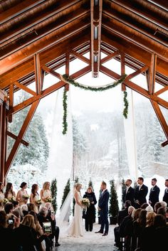 a bride and groom standing at the end of their wedding ceremony