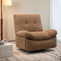 a brown recliner chair sitting on top of a carpeted floor next to a lamp