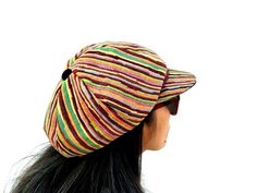 This Rainbow color newsboy cap hat is perfect for Summer Festivals. This solid hat features a Jamaican Rasta Inspired Striped Band atop a solid , Rainbow  color hat. Rock this hat as you dance the night away at your next outdoor concert or event. Fashionable and a must-have . This Hat is unisex that looks great on both men and women . This Hat is very durable and can be used as a special gift . -One Size Fits Most  -Perfect for Summer Festivals Color : Blue Color / Rasta Bucket Hat / Reggae Hat Multicolor Visor Baseball Cap One Size, Multicolor Visor Baseball Cap, Adjustable Multicolor Baseball Cap, Multicolor Fitted Cap One Size Fits Most, Multicolor Fitted Cap One Size, Multicolor Fitted Cap, Retro Cap Hat One Size, Retro Multicolor Adjustable Baseball Cap, Multicolor Short Brim Baseball Cap