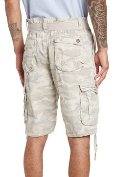 Ideal for everyday wear, these belted cotton cargo shorts deliver casual style with functional utility. 11" rise, 11" inseam (size 32) Belted waist Zip fly with button closure Front slant pockets Back button flap pockets Leg cargo pockets Woven construction Drawstring tie hems 100% cotton Machine wash cold, tumble dry low Imported Model stats: 6'1" height, 32" waist. Model is wearing size 32. X Ray, Flap Pocket, Cargo Shorts, Mens Short, Camo, Casual Style, Everyday Wear, Nordstrom, How To Wear