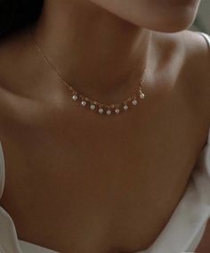 "Freshwater pearl multiple-chain choker necklace. Tiny Pearl fringe necklace. drop necklace. Station choker. Dainty necklace. Gift for her Gorgeous pearl dangle choker necklace! Simple yet feminine, this freshwater pearl necklace it's perfect on its own or layered with some of your favourite necklaces. Definetely a great piece for everyday or a wedding. Elegant and trendy, it will enhanced any outfit! This dainty necklace pearl features nine genuine freshwater pearls that dangles from a delicate Wedding Pearl Choker, Dainty Feminine Jewelry, Elegant Pearl Necklace, Simple Pearl Jewelry, Prom Jewlrey, Perl Neckles, Everyday Necklace Simple, Simple Bridal Necklace, Gold And Pearl Necklace