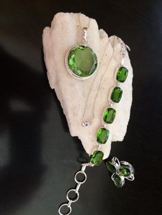 Make a great gift of sparkling jewelry to a friend or loved one. This sparkling Peridot set has great color, fire and displays sharp brilliance. Dating back to ancient Egypt, Peridot was a favorite of Cleopatra, who wore the stone for its beauty and to ward off evil spirits. According to legend, the Queen's emeralds were actually Peridot crystals, which share a similar aesthetic to the highly prized jewel. It is known as the poor man's Emerald because of its less expensive price. Selling for $14 Mens Tassel Loafers, Ward Off Evil Spirits, Sparkling Jewelry, Peridot Crystal, Necklace Ring, Sparkle Jewelry, Hand Painted Leather, Painting Leather, Evil Spirits