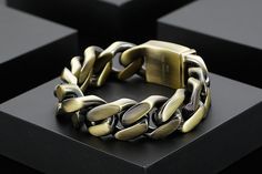 This vintage bracelet offers a luxury party style for endless fun. Styled of stainless steel, this bracelet is themed in a geometric design that makes a perfect style pick. This staple bracelet can be a birthday gift. Wear this bracelet to make a statement on special occasions to radiate eclectic charm effortlessly. Specifications Style: Hiphop/Rock Stainless Steel Bracelets For Men: Mannen Armband Shape\pattern: Geometric Origin: Mainland China Occasion: Party/Birthday Gifts/Gifts For Him Model Luxury Metal Bracelets With Stainless Steel Clasp, Trendy Jewelry With Stainless Steel Clasp For Gift, Luxury Adjustable Stainless Steel Chain Bracelet, Rectangular Metal Bracelets Engraved, Adjustable Durable Gold Bracelets, Adjustable Chain Bracelet As Gift, Durable Adjustable Chain Bracelet For Gift, Adjustable Durable Chain Bracelet As Gift, Durable Adjustable Chain Bracelet As A Gift