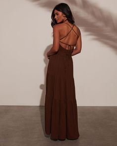 Embrace the season’s free-spirited charm with the Meadows Edge Tiered Maxi Dress. This dreamy dress features a tiered silhouette in lightweight, pleated fabric that dances with every step. The smocked bodice and bust cut-out add a touch of whimsy, while the crisscross back tie closure brings a relaxed yet refined vibe. With pull-on styling that’s as breezy as a summer day, it’s your go-to for sun-soaked adventures and laid-back evenings. Pleated lightweight fabric with tiered silhouette Smocked bodice Bust cut-out Crisscross back tie closure Pull-on styling Unlined Shell 80% Rayon 20% Polyester Lining 100% Polyester Western Wear Dresses, Dreamy Dress, Pleated Fabric, The Meadows, Tiered Maxi Dress, Vacation Dresses, Free Spirited, Western Wear, Free Spirit