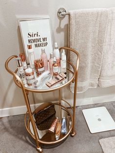 a gold trolley with personal care items on it