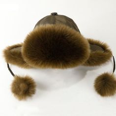 Elevate your style by adding this adorable hat to your winter skiing caps collection. The windproof hat for stylish adult women is made from a high quality combination of cotton, polyester, and faux fur materials. It's a warm Russian hat with ear flaps that is designed with a solid pattern. This trapper cap is available in a choice of 5 colors.

Specifications
Brand Name: GeraldBlack
Gender: WOMEN
Department Name: Adult
Origin: CN(Origin)
Model Number: HT3448
Pattern Type: Solid
Item Type: Bombe Windproof Cap For Fall, Windproof Brimmed Hats For Fall, Warm Brimmed Hats For Outdoor, Winter Cap With Plush Lining, Winter Beanie Hat With Faux Fur Lining, Brown Windproof Beanie Hat, Windproof Hats With Ear Flaps For Fall, Warm Brown Hat For Outdoor Activities, Winter Cap With Fleece Lining