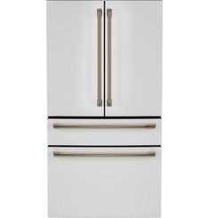 a white refrigerator freezer sitting inside of a kitchen