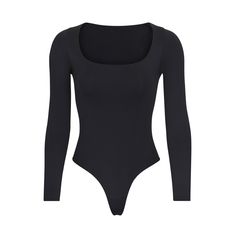 This long sleeve scoop neck bodysuit is smoothing, supportive, and fits like a second skin. Features a raw cut scoop neckline, double snap closure at the bottom gusset, and a thong back for no panty lines. Fits true to size. | SKIMS Essential Long Sleeve Scoop Neck Bodysuit | Black | Essential Bodysuits Dream Reality, Body Noir, Slim Bodysuit, Bodysuit Outfit, Body Manga Longa, Scoop Neck Bodysuit, Body Suit Outfits, La Girl, Makeover Ideas