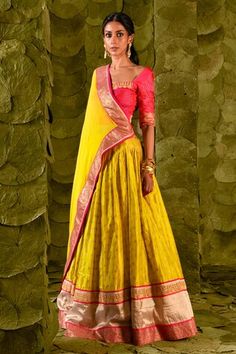 Passionfruit yellow lehenga with gold zari beaten hand embroidery. Paired with a pink embroidered blouse and fan pleat trimmed embroidered dupatta. - Aza Fashions Yellow Pre-draped Saree For Transitional Wedding Season, Festive Yellow Fitted Pre-draped Saree, Transitional Season Gold Lehenga With Gota Work, Transitional Gold Lehenga With Gota Work, Transitional Season Yellow Anarkali Set Traditional Drape, Yellow Fitted Floor-length Pre-draped Saree, Yellow Raw Silk Choli With Dupatta, Transitional Yellow Raw Silk Anarkali Set, Yellow Bollywood Traditional Wear For Transitional Season