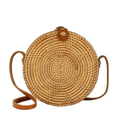 Functional and stylish, this summer essential Rattan Straw Circle Tote Handbag from Made Terra, makes a perfect go-to essential. Hand crafted with straw in a round shape, this tote handbag adds an artisanal touch to your accessory collection. The main compartment offers ample space for your wallet, cell phone and other belongings. And with the shoulder strap, this natural tote handbag offers easy carrying and pairing with your outfits. Measurement: 8" Inch x 2.8"Inch Materials: Straw, Genuine Le Summer Jute Bag With Round Handle, Trendy Woven Straw Bag With Round Handle, Trendy Straw Bag With Round Handle For Vacation, Casual Jute Straw Bag With Round Handle, Jute Straw Bag With Round Handle For Travel, Casual Straw Beach Bag With Round Handle, Summer Straw Shoulder Bag With Round Handle, Natural Color Bags With Round Handle For Beach Season, Spring Natural Beach Bag With Round Handle