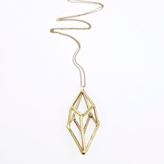 Brass Geometric Prism Necklace by theresekuempel on Etsy https://www.etsy.com/listing/238777423/brass-geometric-prism-necklace Gold Geometric Brass Jewelry, Unique Gold Faceted Necklaces, Gold Geometric Metal Necklace, Prism Necklace, Lost Wax Casting, Brass Chain, Unique Necklaces, Pendant Necklaces, Necklace Etsy