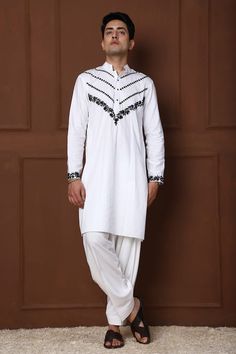 White kurta with thread embroidered floral jaal and geometric patterns. Comes with a pathani. - Aza Fashions Bollywood Style Cotton Sherwani With Dabka, Bollywood Cotton Sherwani With Dabka, Fitted Cotton Sherwani For Navratri, Semi-stitched Cotton Kurta For Traditional Ceremonies, Cotton Salwar Kameez With Resham Embroidery For Traditional Ceremonies, Unstitched Cotton Sherwani For Navratri, Traditional Cotton Sherwani For Navratri, White Cotton Sherwani For Transitional Season, Transitional Season Cotton Sherwani With Traditional Fit