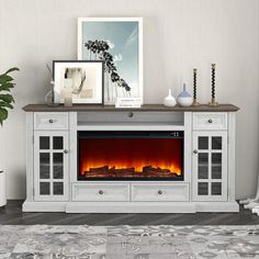 an entertainment center with a fireplace in the middle