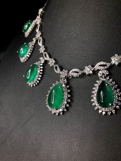 "\"The Teardrop Emerald Necklace\" - Worldclass masterpiece! THIS SET IS A MUST HAVE FOR ANY JEWELRY COLLECTOR! HUGE AND SPARKLING! Vivid green emeralds with full gemological certificates! Surrounded by almost 14 carats of DIAMONDS! Glamorous! Set in one of a kind, elegant 18K solid white gold, handmade settings! Suggested Retail price: $65,000 USD NECKLACE & PENDANT: Central emerald: 8.80 carats! Vivid green, with great translucency. Accented Cabochon Teardrop Emeralds: 6 pieces: 35.21 cara Earrings Chain, Vs Diamond, Emerald Necklace, White Gold Earrings, Exclusive Jewelry, Chain Pendant, High Jewelry, Pendant Set, Chain Pendants