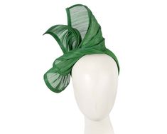 Made from real silk abaca, this masterpiece is hand-crafted to perfection by our experienced milliners in Melbourne. Green racing fascinator to go with your spring racing outfit. Please allow couple of days for creation of your fascinator.  Made in Australia  Real silk abaca  Stylish, elegant design  Comfortable headband Green Fitted Fascinator For Races, Green Fitted Fascinator For Kentucky Derby, Fitted Green Fascinator For Races, Green Fitted Headpiece For Royal Ascot, Green Headpiece For Evening In Spring, Spring Evening Green Headpieces, Adjustable Green Evening Fascinator, Green Mini Hat For Summer Races, Green Mini Hats For Summer Races