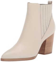 PRICES MAY VARY. The Alva bootie is a must-have staple with a walkable block heel and dual gores at the sides for the perfect fit. Slip on Closure Pointed Toe Imported White Leather Boots, White Boots, Marc Fisher, Ankle Bootie, White Casual, Casual Boots, Ankle Booties, White Leather, Bootie