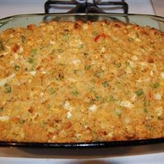 a casserole dish is sitting on top of the stove, ready to be eaten