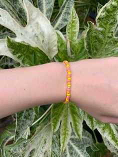 Our beaded bracelets are handmade with care. This sunrise bracelet has an elastic thread meaning it can fit most wrists (15cm-22cm) It is produced with pink, orange, yellow and silver beads and has a lobster claw to ensure it fits to perfection. Our bracelets are packaged carefully with a hand-written thank you note. If you have any questions don't be afraid to ask! Also available in a necklace-find this on our page! Instagram- @beachyxbeautiful Yellow Friendship Bracelets With Letter Beads, Handmade Orange Friendship Bracelets For Everyday, Adjustable Orange Bracelets With 8mm Beads, Yellow Stretch Bracelet With Tiny Beads As Gift, Orange Handmade Friendship Bracelets, Adjustable Hypoallergenic Yellow Beaded Bracelet, Yellow Beaded Bracelets With Round Beads For Everyday, Adjustable Orange Beaded Bracelets With Tiny Beads, Adjustable Orange Beaded Bracelet With Tiny Beads