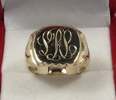 Impressive 10K (stamped) yellow gold men's signet ring. Bears engraved initials "LRL"? SIZE 8.75 (could also be worn as a men's pinkie ring). Weighs 8.13 grams (contains approx. $260.00US in gold). From an estate, ring probably dates to the 1940s or earlier. Classic Yellow Gold Signet Ring With Maker's Mark, Antique Signet Ring With Maker's Mark For Formal Occasion, Classic Engraved Ring With Hallmarks, Heirloom Signet Ring With Maker's Mark For Formal Occasions, Heirloom Style Formal Signet Ring With Maker's Mark, Classic Rectangular Signet Ring Collectible, Vintage Yellow Gold Signet Ring With Maker's Mark, Antique Yellow Gold Signet Ring With Maker's Mark, Yellow Gold Antique Signet Ring With Maker's Mark