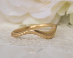 This is a Unique Wedding Band, Gold Wedding Band, Women Wedding Band, Boho Wedding Band, Gold Wave Ring, a beautiful Curved Wedding Band, Modern Wedding Ring. A beautifully handmade gold ring, designed to be timeless and worn forever. This gold ring is uniquely asymmetrical, which makes it look different from every angle you look at. Each ring is made with a matte finish to a modern style. M O D E R N ∙ G O L D ∙ R I N G F E A T U R E S: * Material: 14K white / yellow / rose gold 18K white / yel Boho Wedding Band, Boho Wedding Bands, Modern Wedding Ring, Textured Wedding Band, Wedding Band Gold, Floral Wedding Ring, Modern Wedding Rings, Gold Wave Ring, Delicate Gold Ring